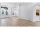 Inviting foyer with high ceilings, wood floors, and an open layout at 674 Whisper Woods Dr, Lakeland, FL 33813