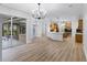 Expansive living room with sliding doors, providing an inviting connection to the outdoor space at 674 Whisper Woods Dr, Lakeland, FL 33813