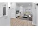Spacious living room featuring wood floors, a fireplace, and a bright, open feel at 674 Whisper Woods Dr, Lakeland, FL 33813