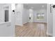 Spacious living room featuring wood floors and a bright, open feel at 674 Whisper Woods Dr, Lakeland, FL 33813