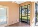 Covered patio with brick flooring and view to backyard at 674 Whisper Woods Dr, Lakeland, FL 33813