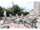 A circular fire pit surrounded by comfortable seating offers a cozy gathering spot for residents at 7853 Summerlake Groves St, Winter Garden, FL 34787