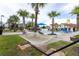 A hammock is set in the pool area with palm trees and plenty of space for enjoying the outdoors at 7853 Summerlake Groves St, Winter Garden, FL 34787