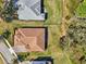Directly overhead shot of a home's backyard, with a focus on landscaping and property boundaries at 8064 Peaceful Cir, Sanford, FL 32771