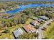 Aerial view of stunning homes, showcasing lush greenery and a tranquil lakeside setting at 8064 Peaceful Cir, Sanford, FL 32771