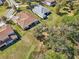Aerial view capturing the backyard layouts, landscaping, and overall property lines at 8064 Peaceful Cir, Sanford, FL 32771
