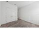 Bedroom featuring carpet flooring, a closet with double doors, and natural light at 8064 Peaceful Cir, Sanford, FL 32771