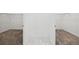 Walk-in closet providing ample storage space with white baseboards, tile floors and metal racks at 8064 Peaceful Cir, Sanford, FL 32771