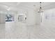 Large living room that opens up to the kitchen with plenty of natural light at 8064 Peaceful Cir, Sanford, FL 32771