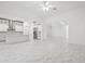 Bright and airy living space with a large kitchen island, open floor plan, and marble flooring at 8064 Peaceful Cir, Sanford, FL 32771