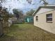 Backyard area with additional sheds for storage at 1130 E Bay St, Winter Garden, FL 34787