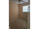 Bedroom featuring a neutral color scheme, window with blinds, and simple outlets at 1130 E Bay St, Winter Garden, FL 34787