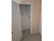 Walk-in closet featuring a neutral color scheme, and a clothing rod at 1130 E Bay St, Winter Garden, FL 34787