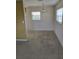 Dining room view with a simple light fixture and a window with blinds at 1130 E Bay St, Winter Garden, FL 34787