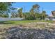 Expansive backyard featuring a large grassy area and a privacy fence at 1183 Feather Dr, Deltona, FL 32725