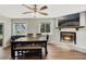 Cozy dining room with wood-look flooring, gas fireplace, perfect for Gathering gatherings at 1183 Feather Dr, Deltona, FL 32725