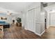 Hallway with hardwood floors and closet space at 1183 Feather Dr, Deltona, FL 32725