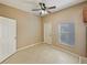 Bonus room featuring tile flooring, window, and entry door at 1260 Honey Blossom Dr, Orlando, FL 32824