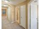 Hallway showing access to bathroom and bedrooms at 1260 Honey Blossom Dr, Orlando, FL 32824