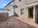 Rear patio with brick flooring and access to the building at 1260 Honey Blossom Dr, Orlando, FL 32824