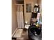 Compact bathroom with modern fixtures and a glass block window for natural light at 131 San Blas Ave, Kissimmee, FL 34743