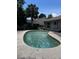 Inviting outdoor pool, surrounded by lush landscaping, perfect for relaxation and recreation at 131 San Blas Ave, Kissimmee, FL 34743