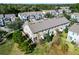 Aerial view of townhomes with lush landscaping, showcasing the community's layout and design at 1335 E 10Th St, Apopka, FL 32703