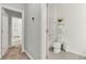 Bright bathroom with neutral paint, tile floors, and white fixtures at 1335 E 10Th St, Apopka, FL 32703