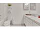 Clean, bright bathroom with modern fixtures, white cabinetry, and a tiled shower-tub combination at 1335 E 10Th St, Apopka, FL 32703