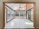 Bright sunroom with tile flooring, lots of natural light, skylight and views to the outside at 136 Raintree Dr, Longwood, FL 32779