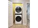 Modern stackable washer and dryer unit conveniently located near the living area at 1371 Tuscan Terrace # 3203, Davenport, FL 33896