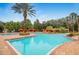 Resort-style pool area with cabanas and lush tropical landscaping, offering a relaxing atmosphere at 1371 Tuscan Terrace # 3203, Davenport, FL 33896