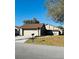 Exterior shot of a well-maintained single Gathering home with a two-car garage and mailbox at 1422 Spalding Rd, Winter Springs, FL 32708