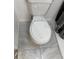 The toilet is white and features gray tiling at 1422 Spalding Rd, Winter Springs, FL 32708