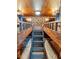 Bunk room featuring wooden bunk beds, wood accents, ladder and starry ceiling at 1427 Fairview Cir, Reunion, FL 34747