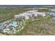 Beautiful aerial view of resort featuring pristine lake views surrounded by lush landscape at 14501 Grove Resort Ave # 2522, Winter Garden, FL 34787