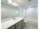 Bathroom featuring a bathtub, shower, and a vanity with quartz counters at 1549 Discovery St, Davenport, FL 33896