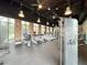 The gym contains state of the art equipment and beautiful brick accent walls for a bright workout at 1549 Discovery St, Davenport, FL 33896