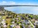 Lakefront community shows homes nestled near the lake, offering residents scenic views at 1562 Auburn Oaks Ct, Auburndale, FL 33823