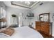 Bedroom with a ceiling fan, desk area, and lots of natural light from the windows at 1562 Auburn Oaks Ct, Auburndale, FL 33823