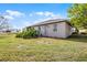 A charming single-story home featuring a well-manicured lawn and neat landscaping at 1562 Auburn Oaks Ct, Auburndale, FL 33823