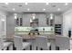 Gourmet kitchen with a large center island, pendant lights, and modern stainless steel appliances at 15644 Panther Lake Dr, Winter Garden, FL 34787