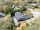 Aerial view of a single-story home featuring a screened pool and beautiful backyard at 1575 Belfast Ct, Apopka, FL 32712