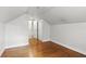 Bright bedroom featuring hardwood floors and white walls, exuding simple elegance at 1975 Staunton Ave, Winter Park, FL 32789