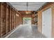 View of the interior of a framed, unfinished garage at 1975 Staunton Ave, Winter Park, FL 32789