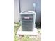 Goodman AC unit on a concrete slab in backyard at 2294 Sunset Way, Davenport, FL 33837