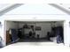 View of open garage with interior items at 2511 Crown Ridge Cir, Kissimmee, FL 34744