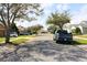 Street view showing neighborhood homes and well-maintained landscaping at 2511 Crown Ridge Cir, Kissimmee, FL 34744