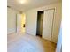 Cozy bedroom with neutral walls, carpet, closet and ensuite bathroom at 2706 Vermillion Ct, St Cloud, FL 34771