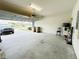 Spacious garage with plenty of parking space at 2706 Vermillion Ct, St Cloud, FL 34771